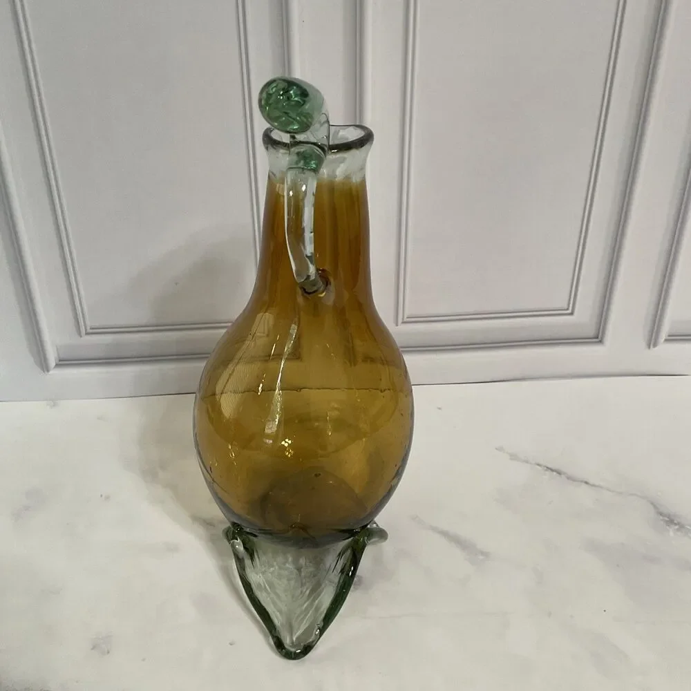 Hand Blown Glass Amber Pitcher with attached Clear Handle 10.5”Tall Clear Base